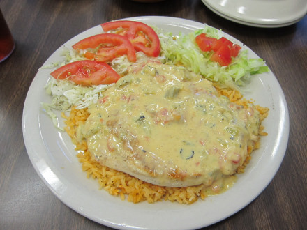 Chicken breast with chile con queso