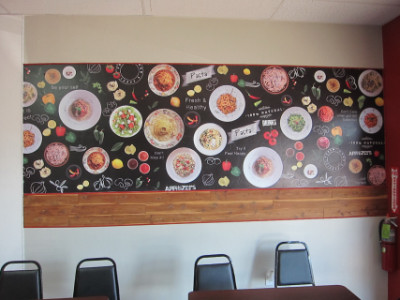 The east wall shows the pasta that is on the menu