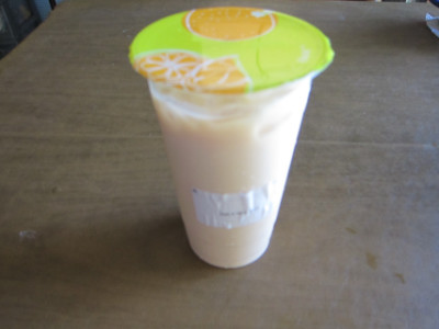 Black milk tea served to go