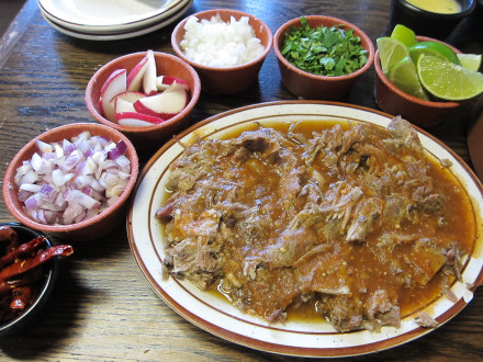 Lamb birria with condiments